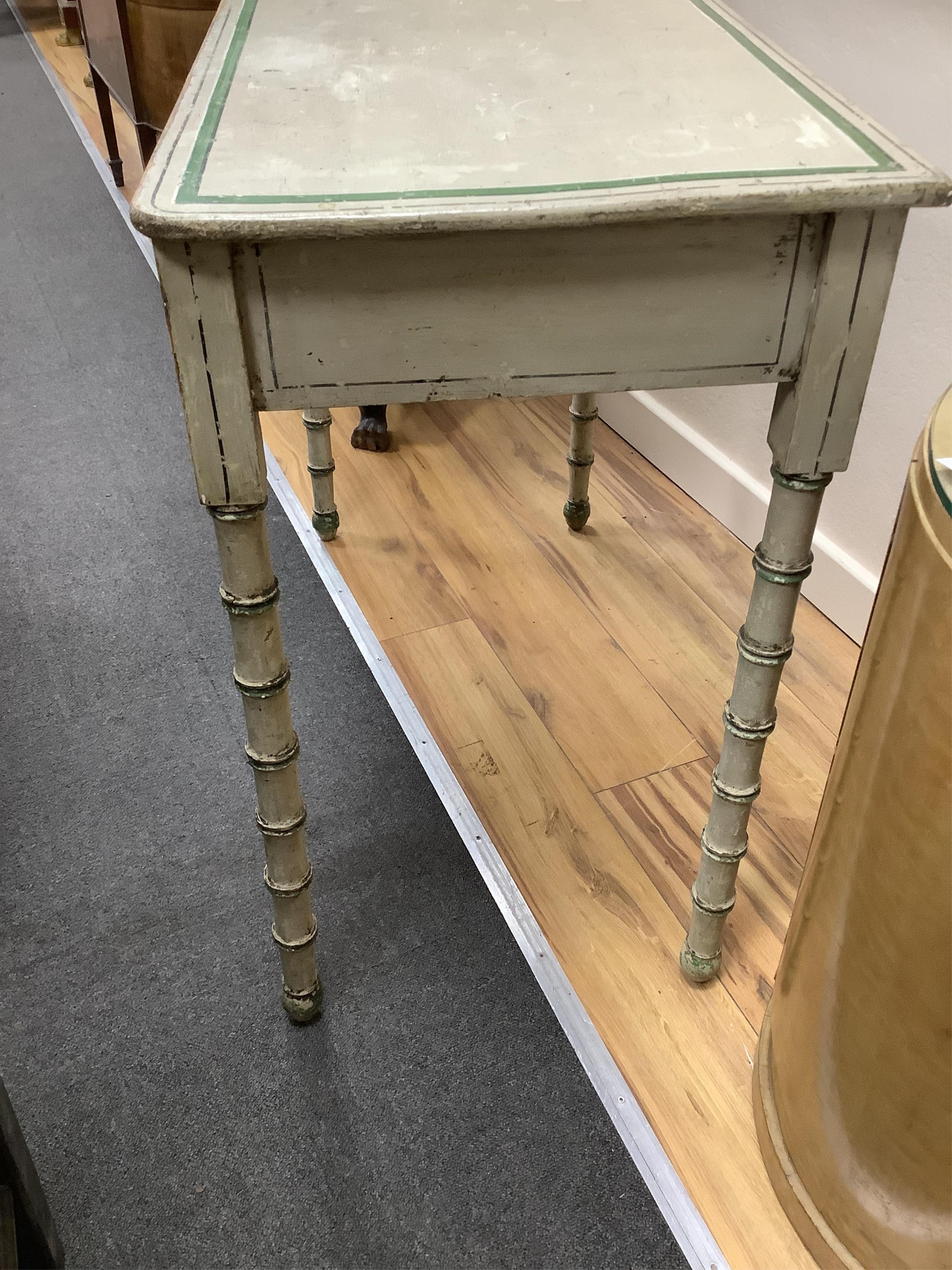 A Regency and later painted simulated bamboo side table in the manner of Colefax and Fowler, width 91cm, depth 44cm, height 78cm. Condition - fair